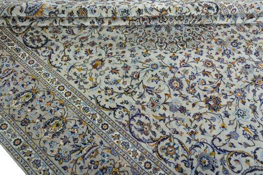 Close-up detail of 2000s Kashan rug from Iran / Persia showing Cork weave
