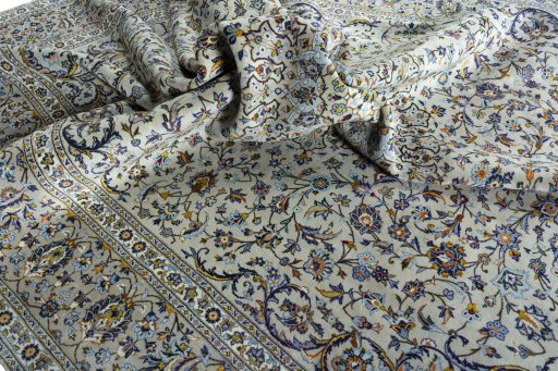 Surface texture of 2000s Kashan rug with natural Cork and intricate pattern