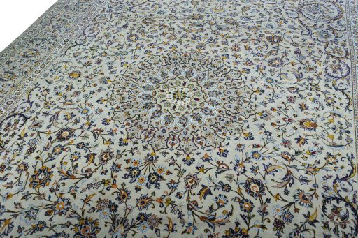 Backside of handmade 2000s Kashan rug showing knot structure and weave density