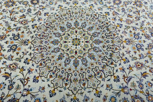 Central medallion detail of 2000s Kashan rug from Iran / Persia