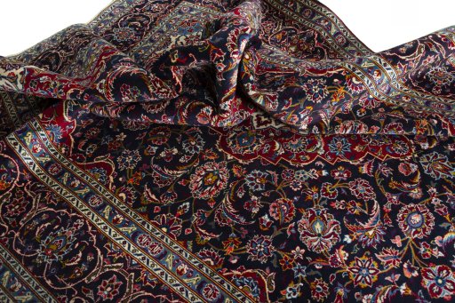 Surface texture of 2000s Kashan rug with natural Wool and intricate pattern