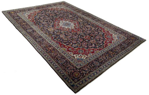 Close-up detail of 2000s Kashan rug from Iran / Persia showing Wool weave