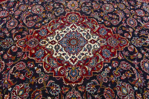 Central medallion detail of 2000s Kashan rug from Iran / Persia