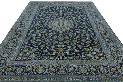 Surface texture of 2000s Kashan rug with natural Wool and intricate pattern