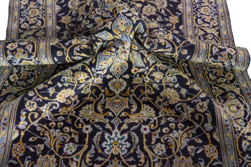 Surface texture of 1970s Kashan rug with natural Wool and intricate pattern