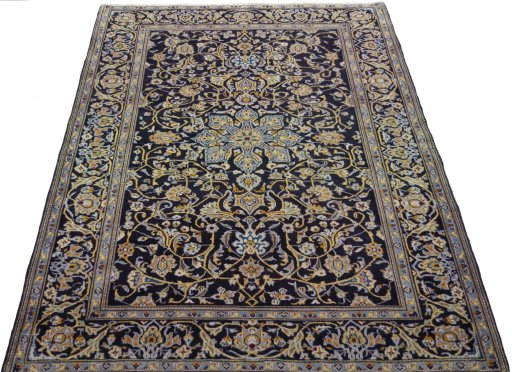Surface texture of 1970s Kashan rug with natural Wool and intricate pattern