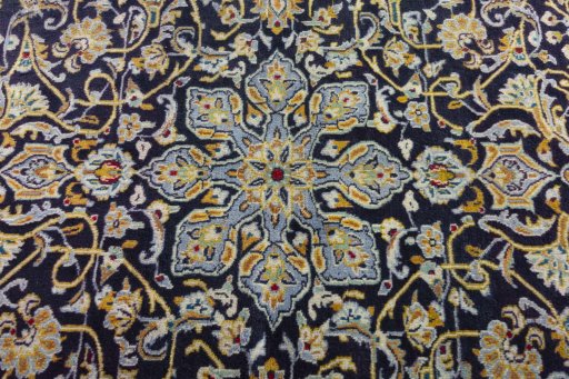 Central medallion detail of 1970s Kashan rug from Iran / Persia