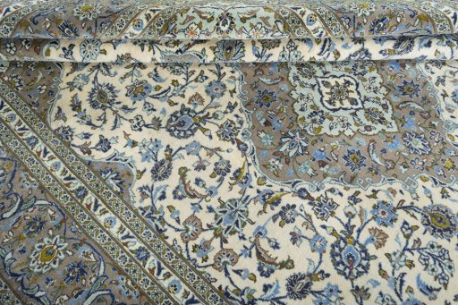 Close-up detail of 2000s Kashan rug from Iran / Persia showing Wool weave