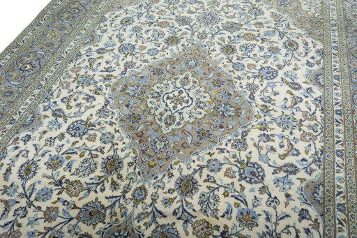 Backside of handmade 2000s Kashan rug showing knot structure and weave density