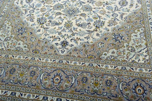 Close-up detail of 2000s Kashan rug from Iran / Persia showing Wool weave
