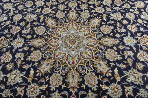Central medallion detail of 2000s Kashan rug from Iran / Persia
