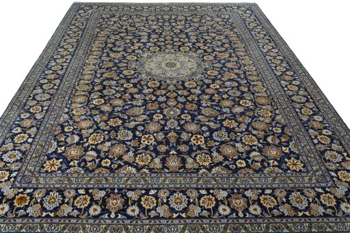 Surface texture of 2000s Kashan rug with natural Wool and intricate pattern