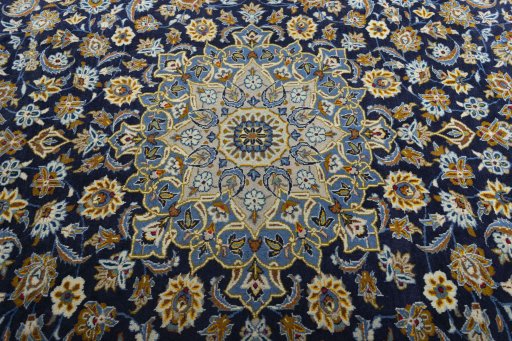 Central medallion detail of 2000s Kashan rug from Iran / Persia