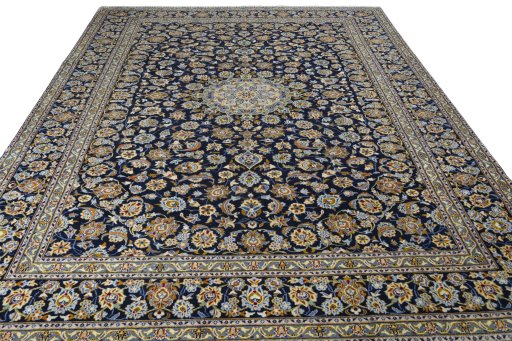 Surface texture of 2000s Kashan rug with natural Wool and intricate pattern