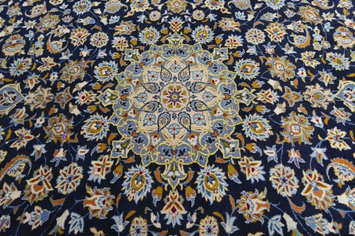Central medallion detail of 2000s Kashan rug from Iran / Persia