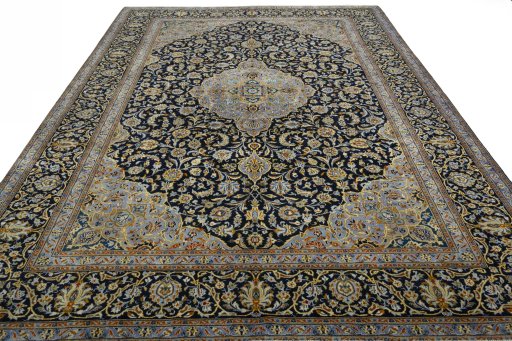 Surface texture of 2000s Kashan rug with natural Wool and intricate pattern
