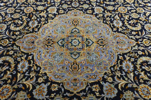 Central medallion detail of 2000s Kashan rug from Iran / Persia