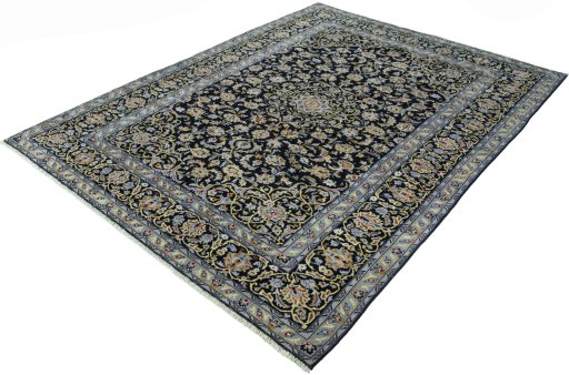 Corner detail of 2000s Kashan rug showing border pattern and Wool pile
