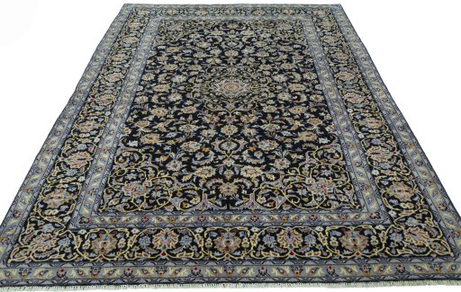 Surface texture of 2000s Kashan rug with natural Wool and intricate pattern