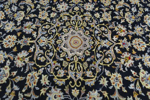 Central medallion detail of 2000s Kashan rug from Iran / Persia