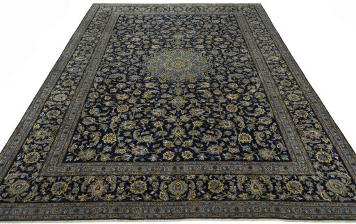 Surface texture of 2000s Kashan rug with natural Wool and intricate pattern