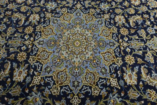 Central medallion detail of 2000s Kashan rug from Iran / Persia