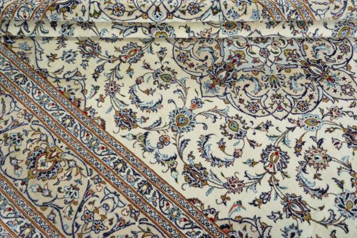 Close-up detail of 2000s Kashan rug from Iran / Persia showing Wool weave
