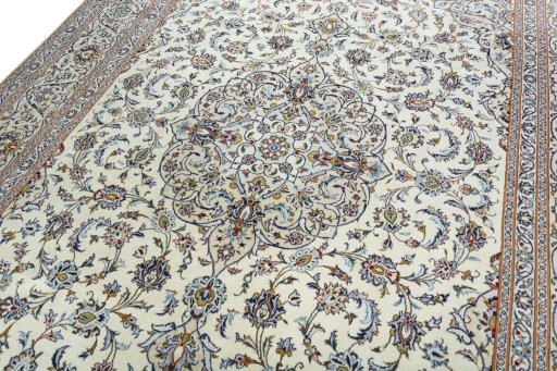 Backside of handmade 2000s Kashan rug showing knot structure and weave density