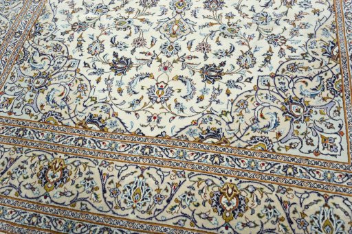 Close-up detail of 2000s Kashan rug from Iran / Persia showing Wool weave