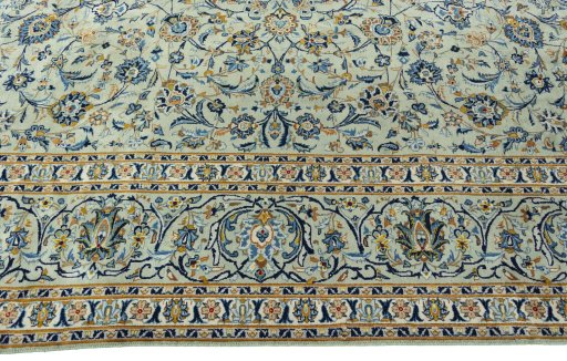 Corner detail of 1970s Kashan rug showing border pattern and Wool pile
