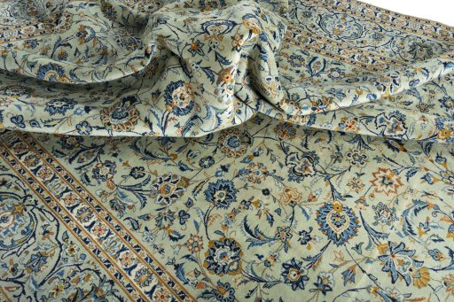 Surface texture of 1970s Kashan rug with natural Wool and intricate pattern