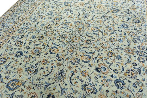 Backside of handmade 1970s Kashan rug showing knot structure and weave density