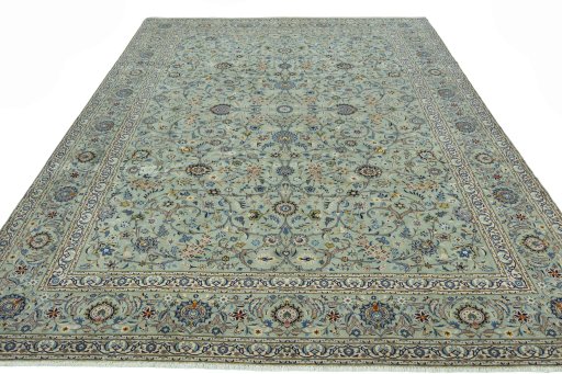 Surface texture of 2000s Kashan rug with natural Wool and intricate pattern