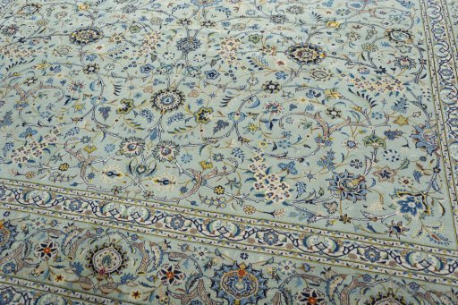 Close-up detail of 2000s Kashan rug from Iran / Persia showing Wool weave