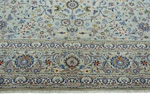 Full view of 2000s Kashan rug from Iran / Persia, 437 × 326 cm in Green tones