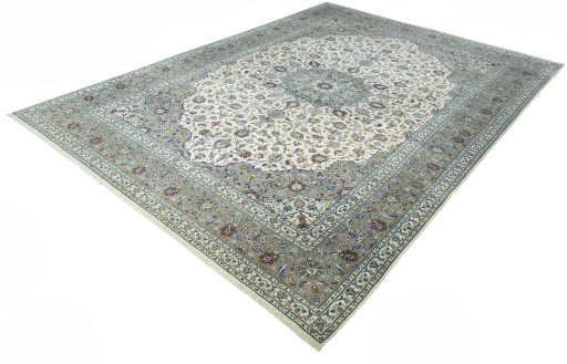 Corner detail of 2000s Kashan rug showing border pattern and Cork pile