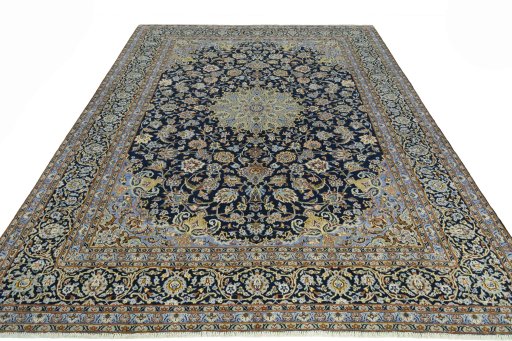 Surface texture of 2000s Kashan rug with natural Wool and intricate pattern