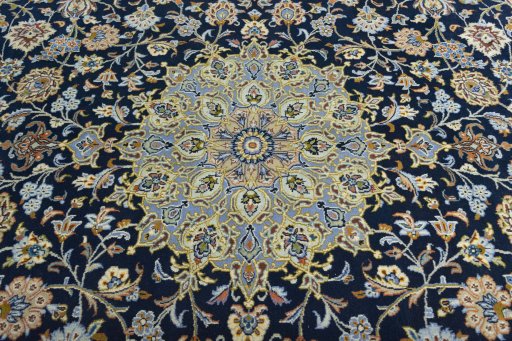 Central medallion detail of 2000s Kashan rug from Iran / Persia