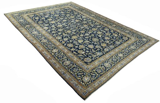 Close-up detail of 2000s Kashan rug from Iran / Persia showing Wool weave