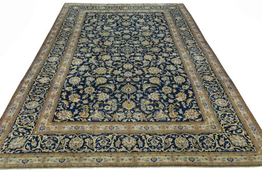 Surface texture of 2000s Kashan rug with natural Wool and intricate pattern