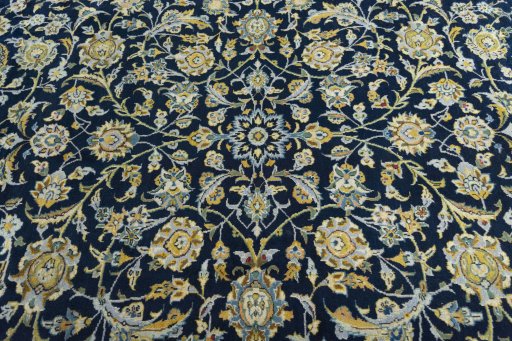 Central medallion detail of 2000s Kashan rug from Iran / Persia