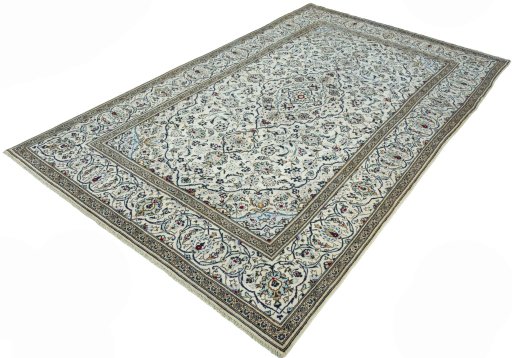 Corner detail of 2000s Kashan rug showing border pattern and Wool pile