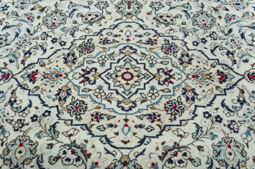 Central medallion detail of 2000s Kashan rug from Iran / Persia