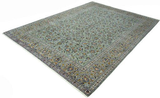 Corner detail of 2000s Kashan rug showing border pattern and Wool pile