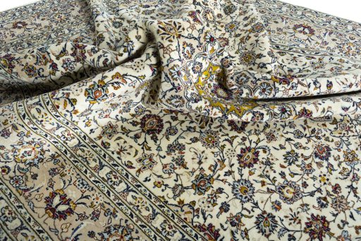 Surface texture of 2000s Kashan rug with natural Cork and intricate pattern