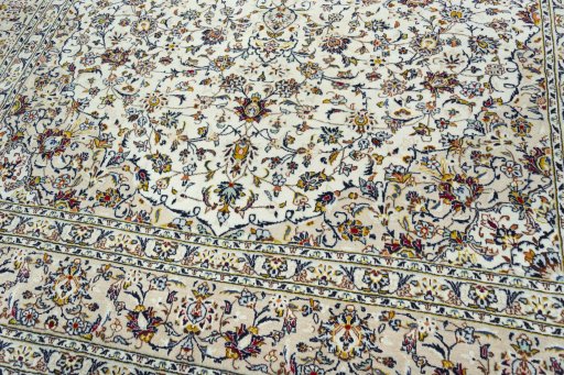 Close-up detail of 2000s Kashan rug from Iran / Persia showing Cork weave