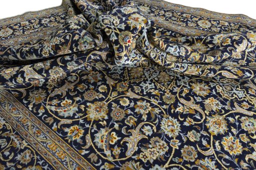 Surface texture of 2000s Kashan rug with natural Wool and intricate pattern