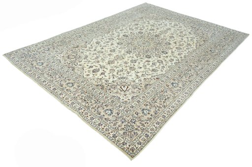 Corner detail of 2000s Kashan rug showing border pattern and Cork pile