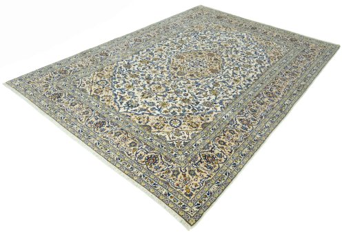 Corner detail of 2000s Kashan rug showing border pattern and Wool pile