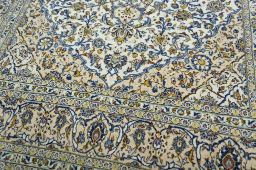 Close-up detail of 2000s Kashan rug from Iran / Persia showing Wool weave